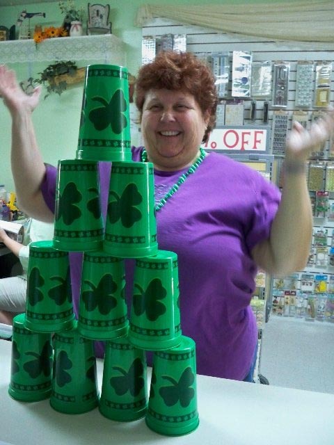 Debbie Playing the Cup Stack Game